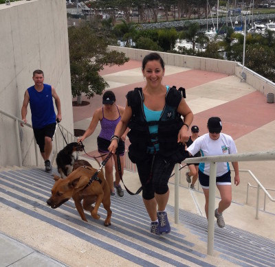 Naomi leading a class on the stairs with a weighted vest on! 